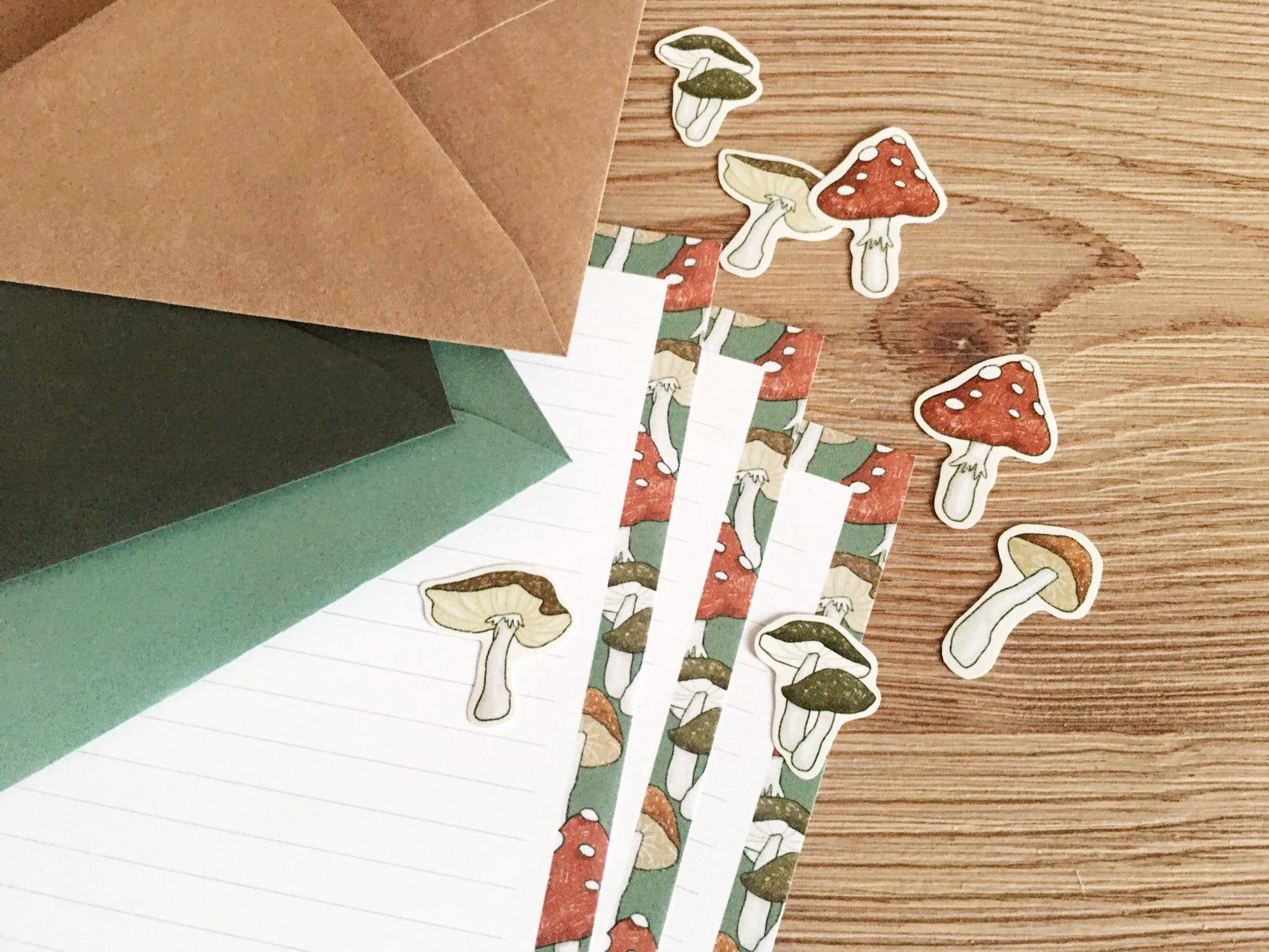 Image of mushroom-themed paper and stickers. 