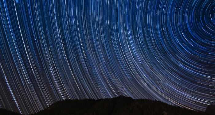 a long exposure photograph of stars in the sky
