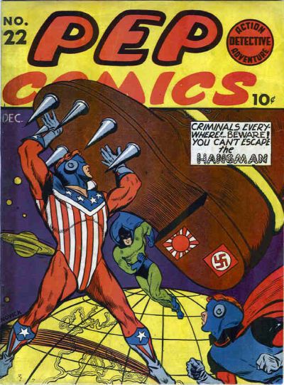 The cover of Pep Comics #22 shows the Shield, a superhero in a red, white, and blue costume, about to be stepped on by a giant booted foot with metal spikes on the sole and the Japanese rising sun and Nazi flags on the heel. Running to help are his sidekick, Dusty the Boy Detective, in a blue and red costume, and a hero called the Hangman, in a blue and green costume.