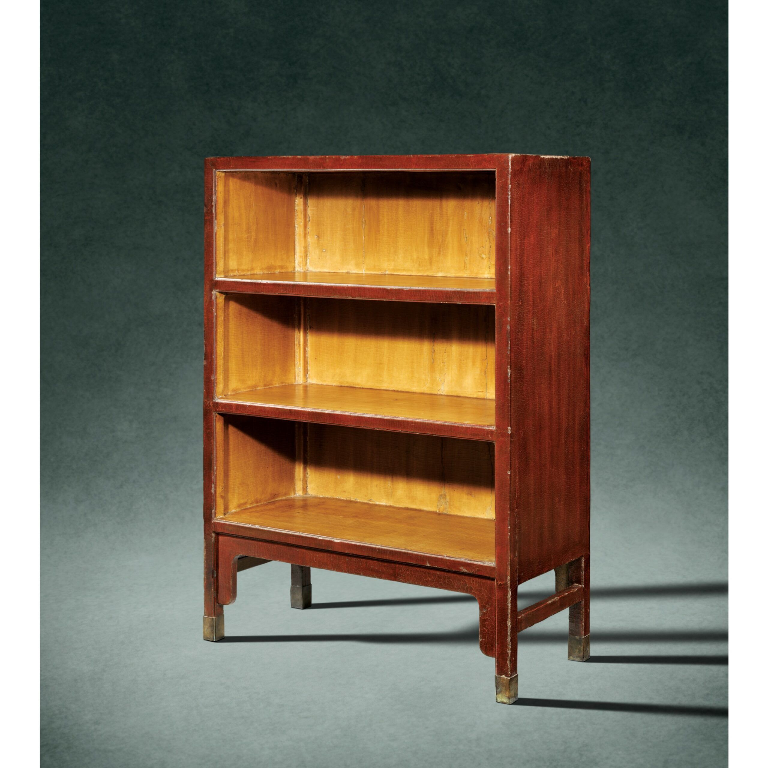 red lacquer bookshelves