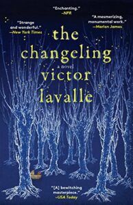 cover of The Changeling by Victor LaValle, illustration of a forest done in white on a blue background