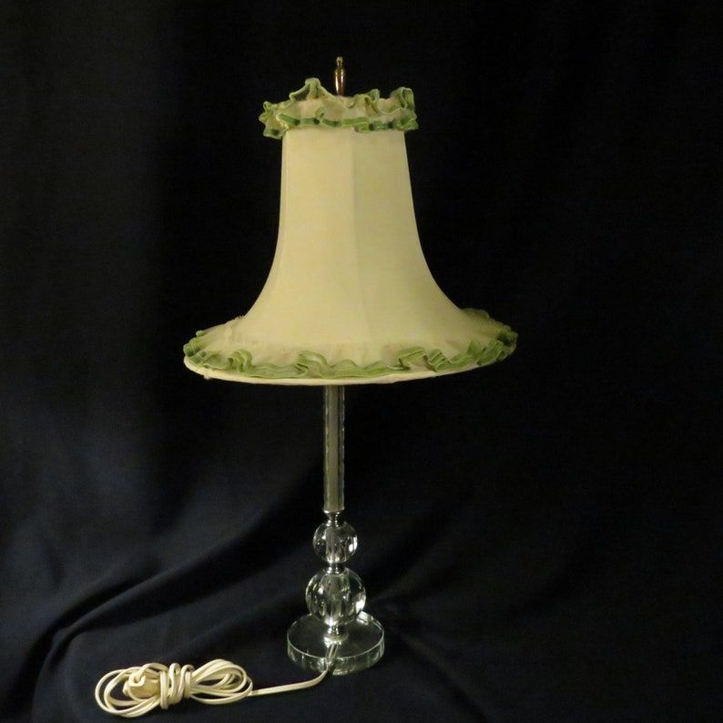 Vintage acrylic table lamp with green lace-trimmed shade