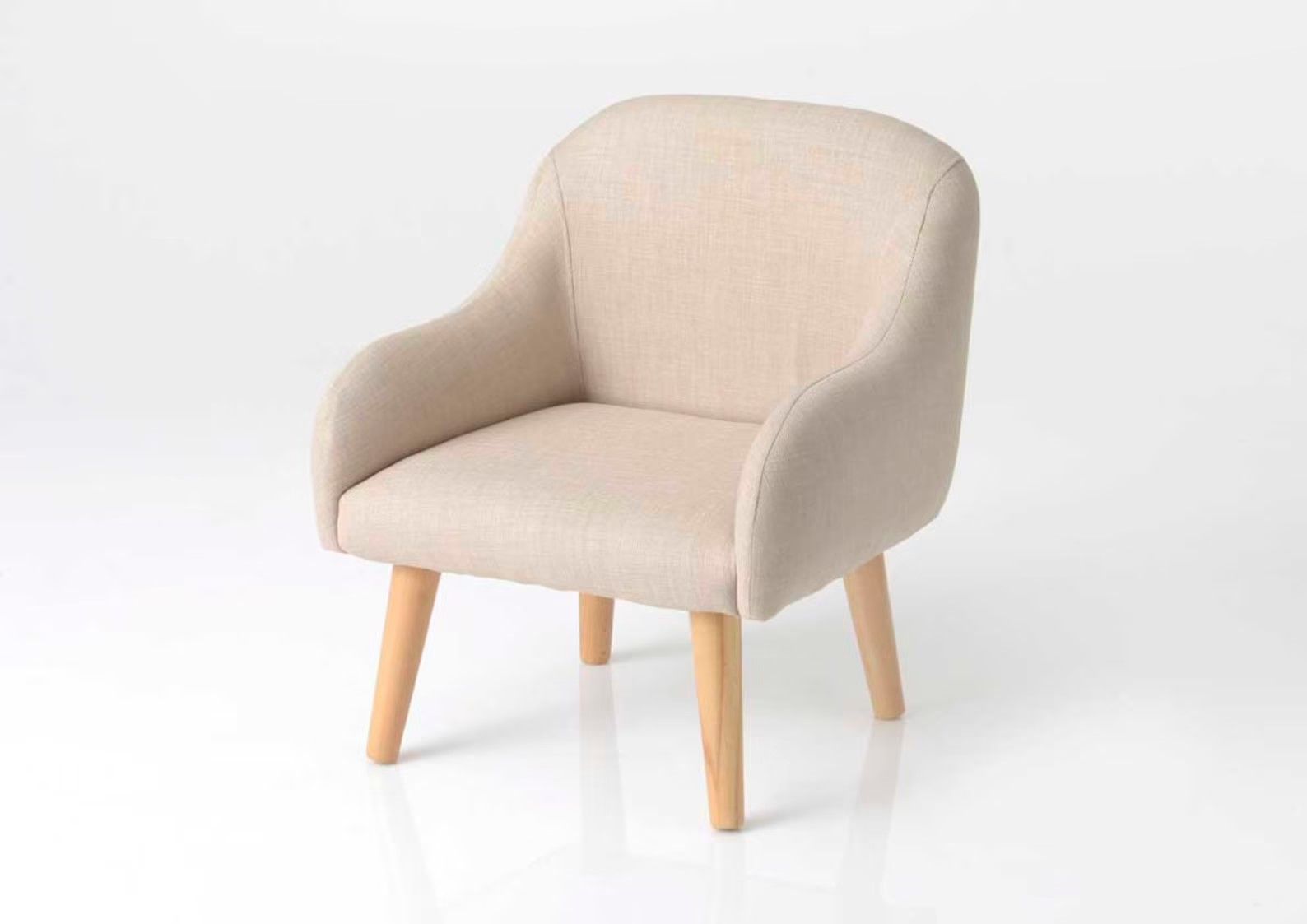 beige chair with light wooden legs
