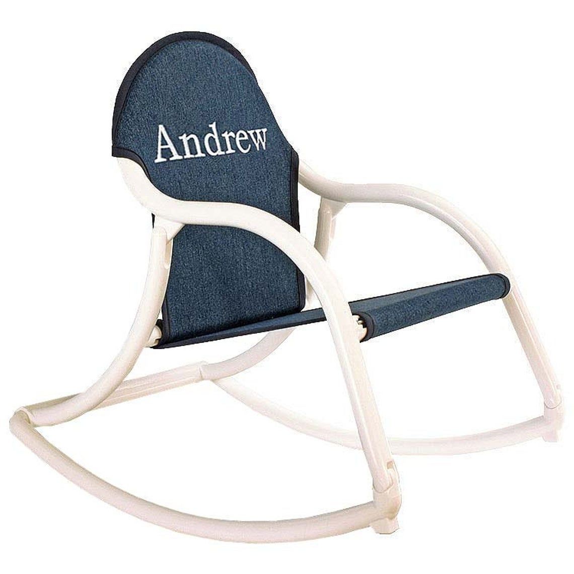 kid-sized rocking chair with denim seat and white arms embroidered with the name Andrew