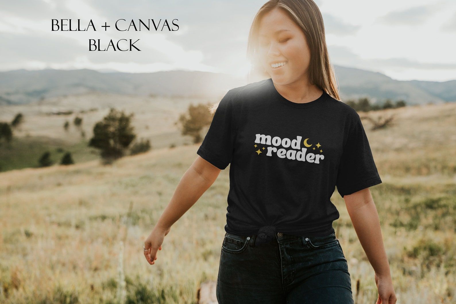 Image of an Asian woman in a black t-shirt which reads "mood reader." 