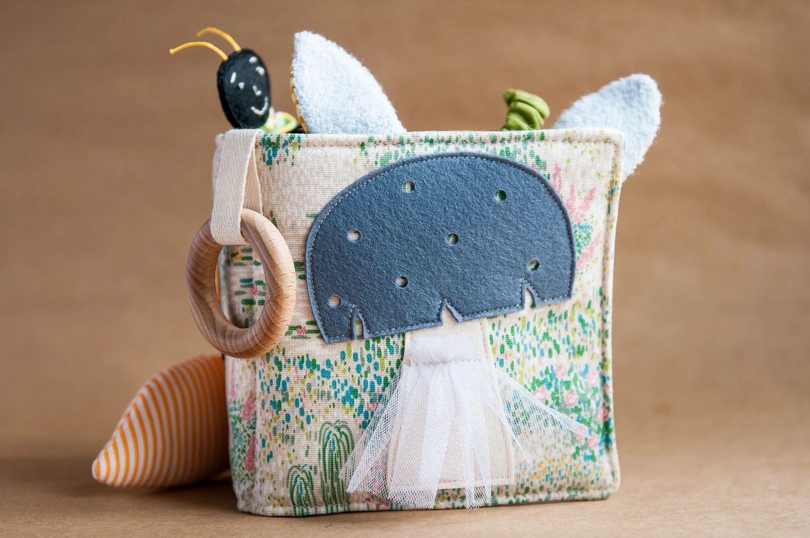 Gift for book lover: cloth book made out of felt and cotton, with sewn mushrooms and bugs.