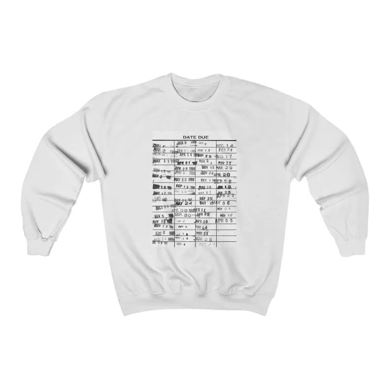White sweatshirt with black and white library date due stamps.