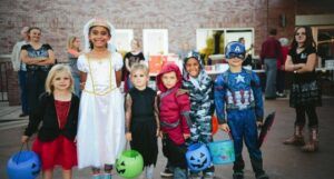 kids in Halloween costumes