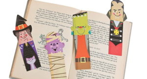 Monster bookmarks on an open book