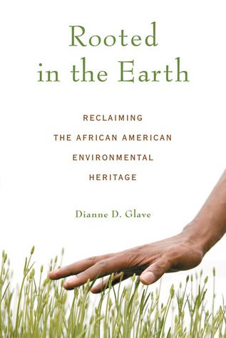 Rooted in the Earth book cover, a hand of a Black person reaches towards the grass