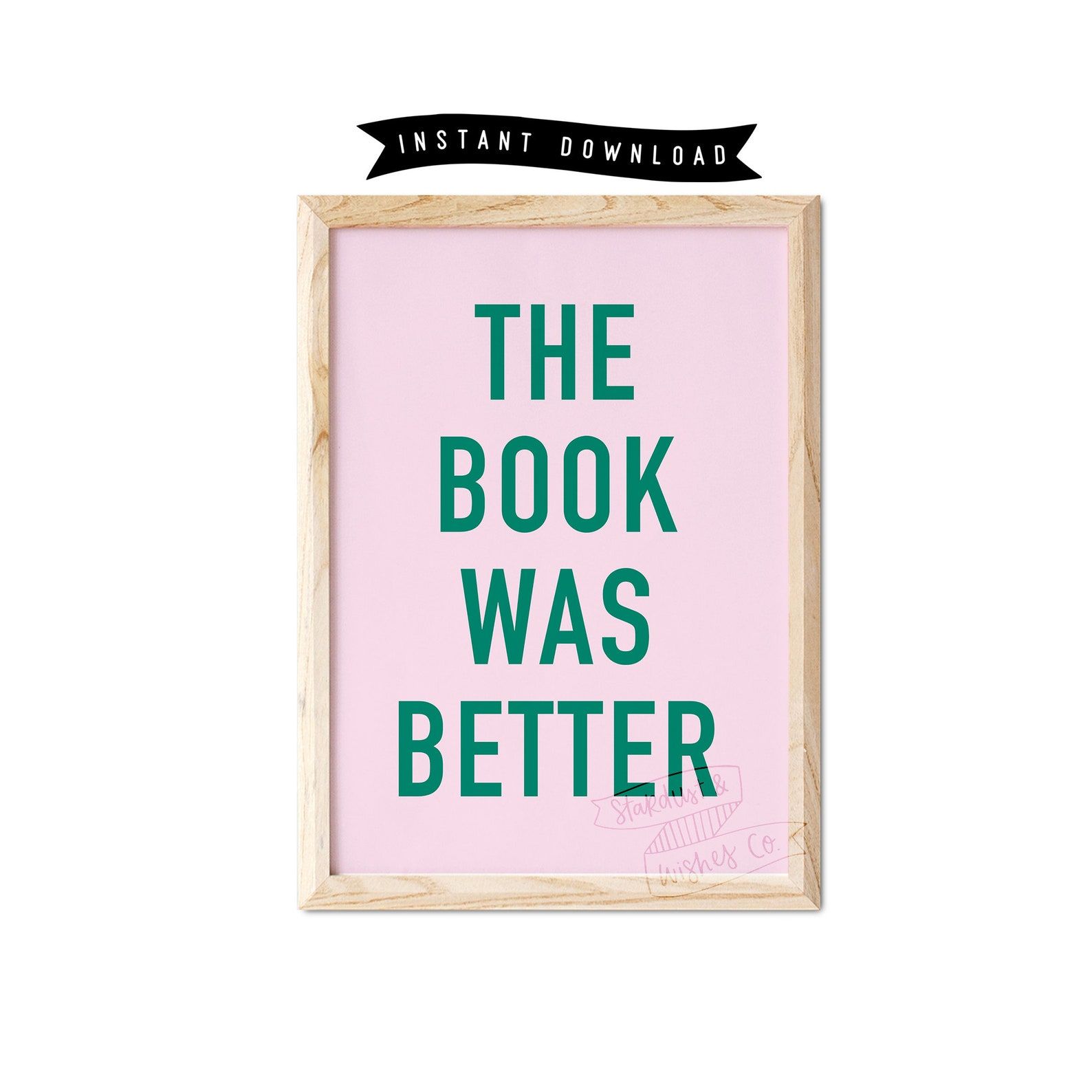 Pink print with the words "the book was better" in green font. 
