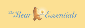 yellow background with "The Bear Essentials" written in blue font with an image of a cartoon bear holding a candle.