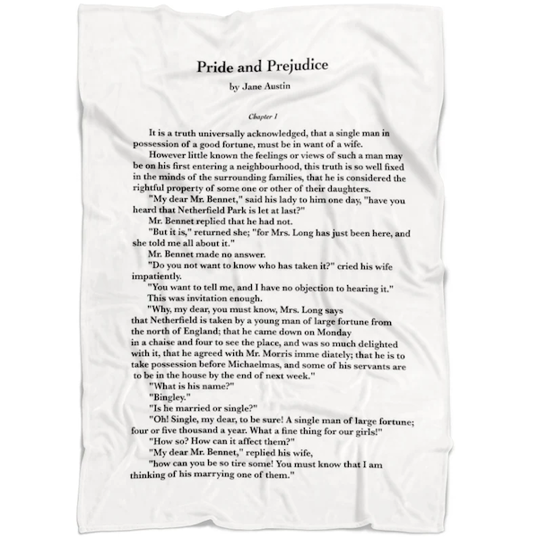 white blanket with white letters featuring the first page of Pride and Prejudice