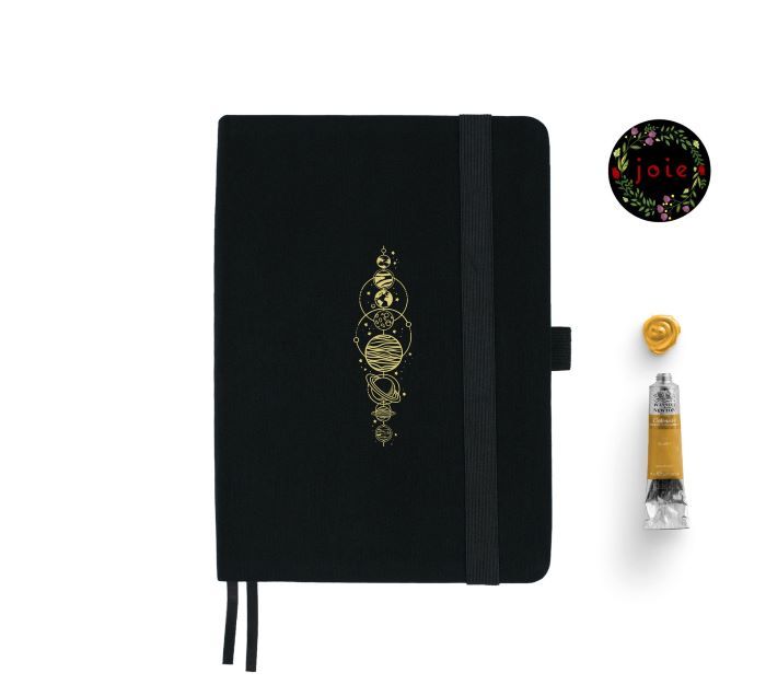 black notebook with planets