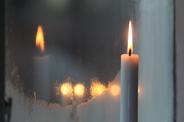 Candlelight reflecting in a mirror