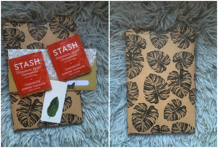 Two images. The first features a book covered in monstera leaves and brown paper, with a bookmark and two tea packets on top. The image on the right is just the covered book.