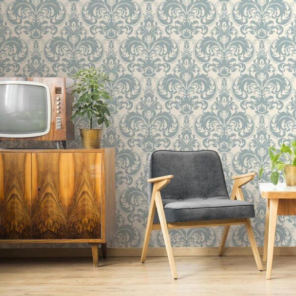 a living room with beige patterned wallpaper