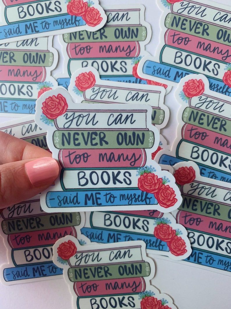 Sticker, a stack of books that says "you can never own too many books"