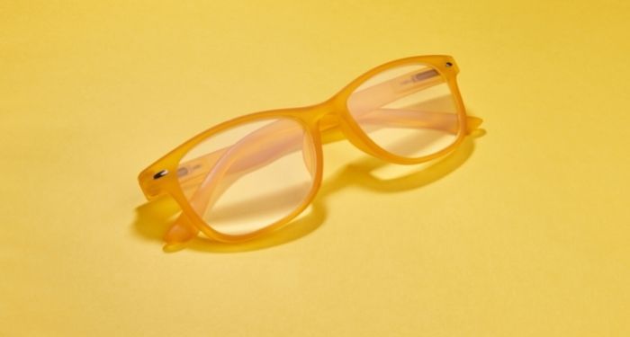 image of yellow glasses on a yellow background