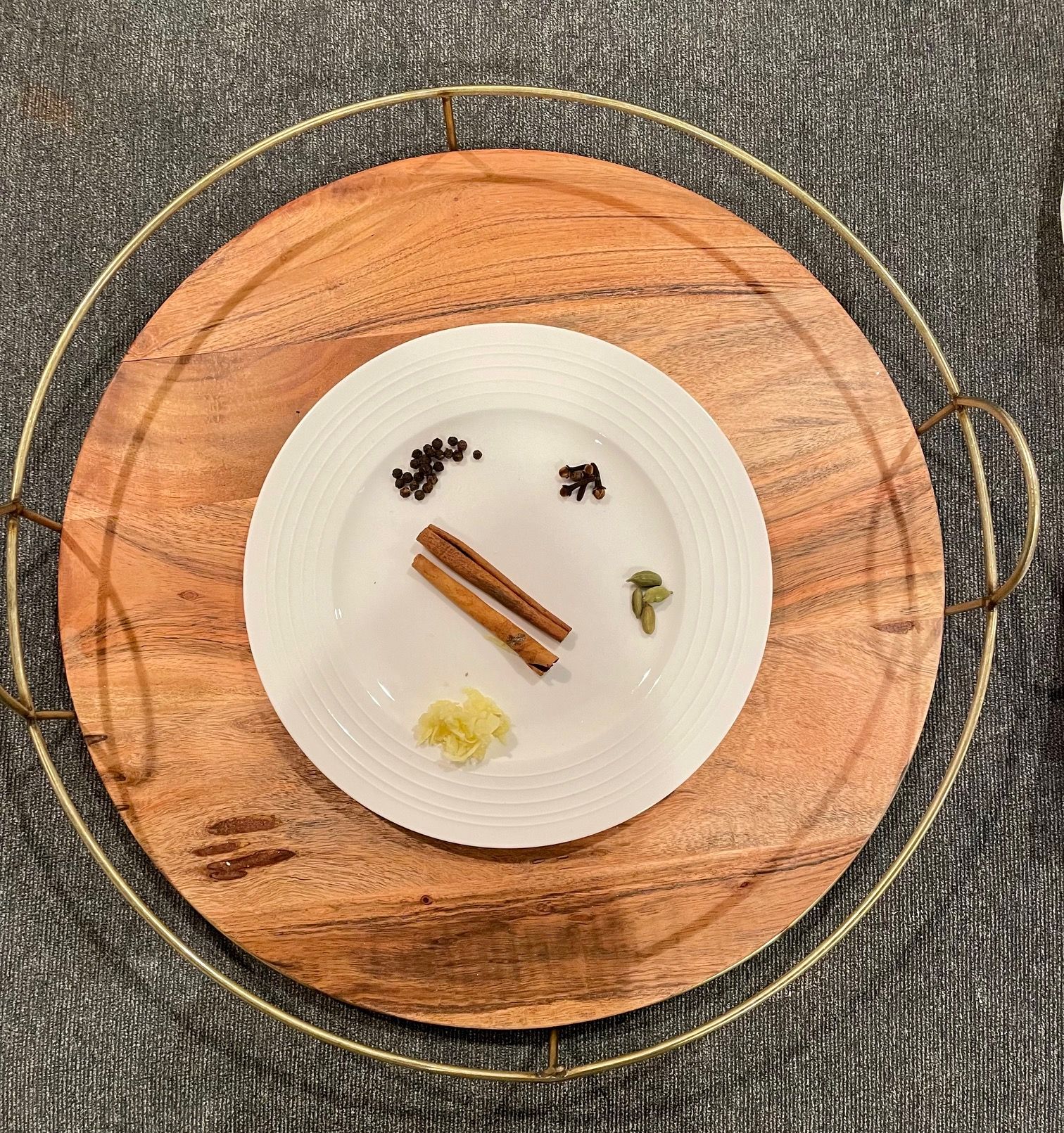 chai spice ingredients on a plate
