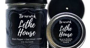 two candles with scents inspired by Leigh Bardugo's Ninth House
