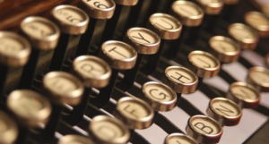 a close up photo of a 1930s typewriter's keys