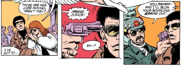 From Wonder Woman #15. Ed Indelicato holds a gun to a man's head.