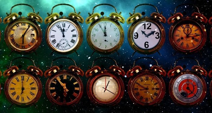 image of several clock on a blue and green background