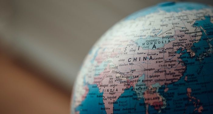 a photo of a globe showing China