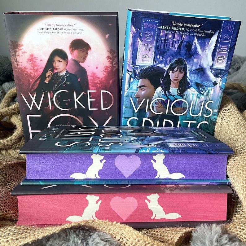 Images of Wicked Fox and Vicious Spirits with pink and purple sprayed edges, hearts, and foxes