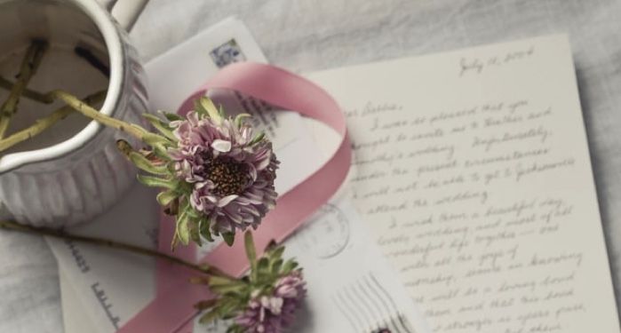 hand-written letter, post card, pink ribbon,