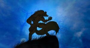 silhouette of a werewolf standing at a precipice against a cloudy blue sky