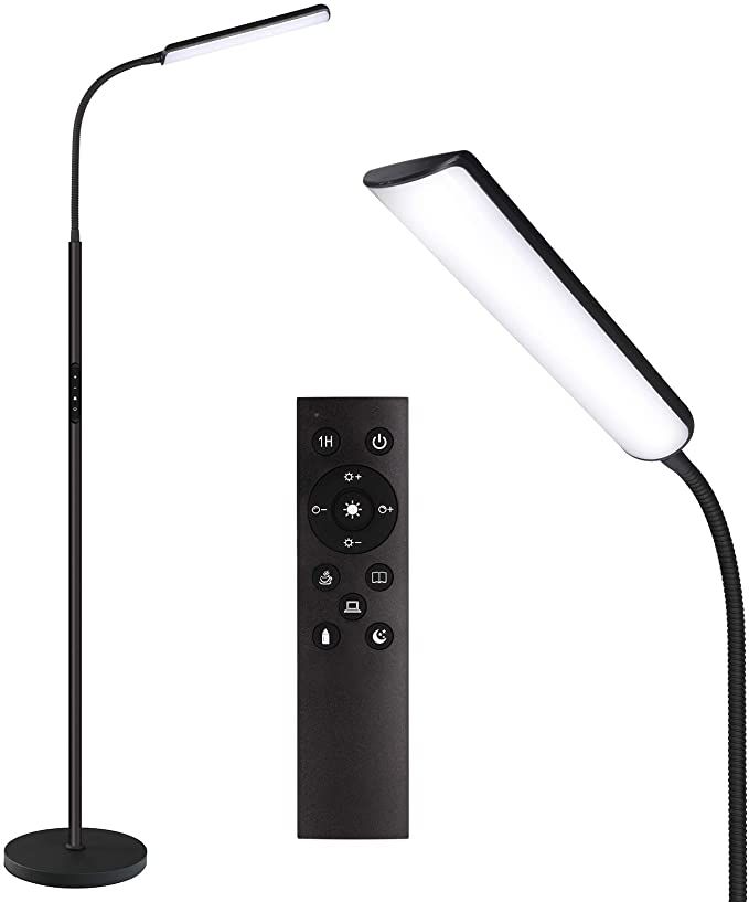 a photo of a black LED floor lamp with a remote