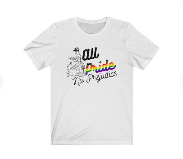 White t-shirt screen printed with "All Pride, No Prejudice" with rainbow font on the word "pride" and a sketch of a woman reading