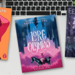 the covers of three fantasy webcomics against a laptop photo