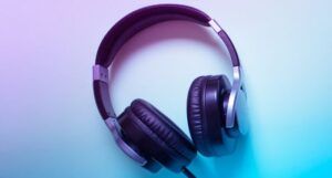 image of headphones on blue and purple background