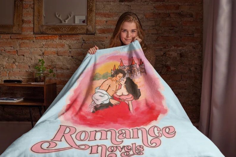 Woman holding Romance Cover Throw Blanket