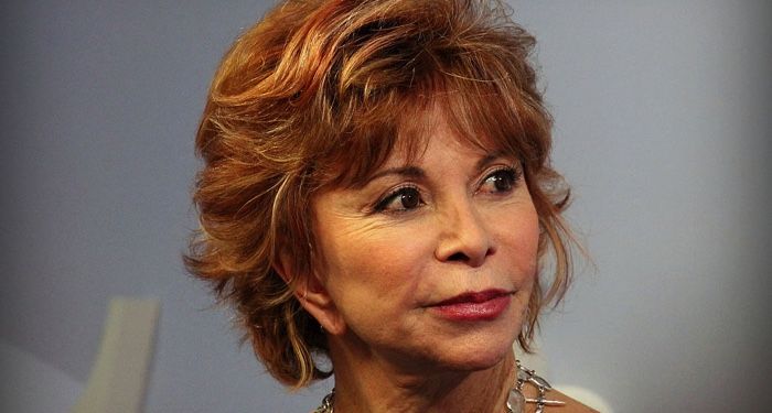 photo of author Isabel Allende with short red-tinted hair