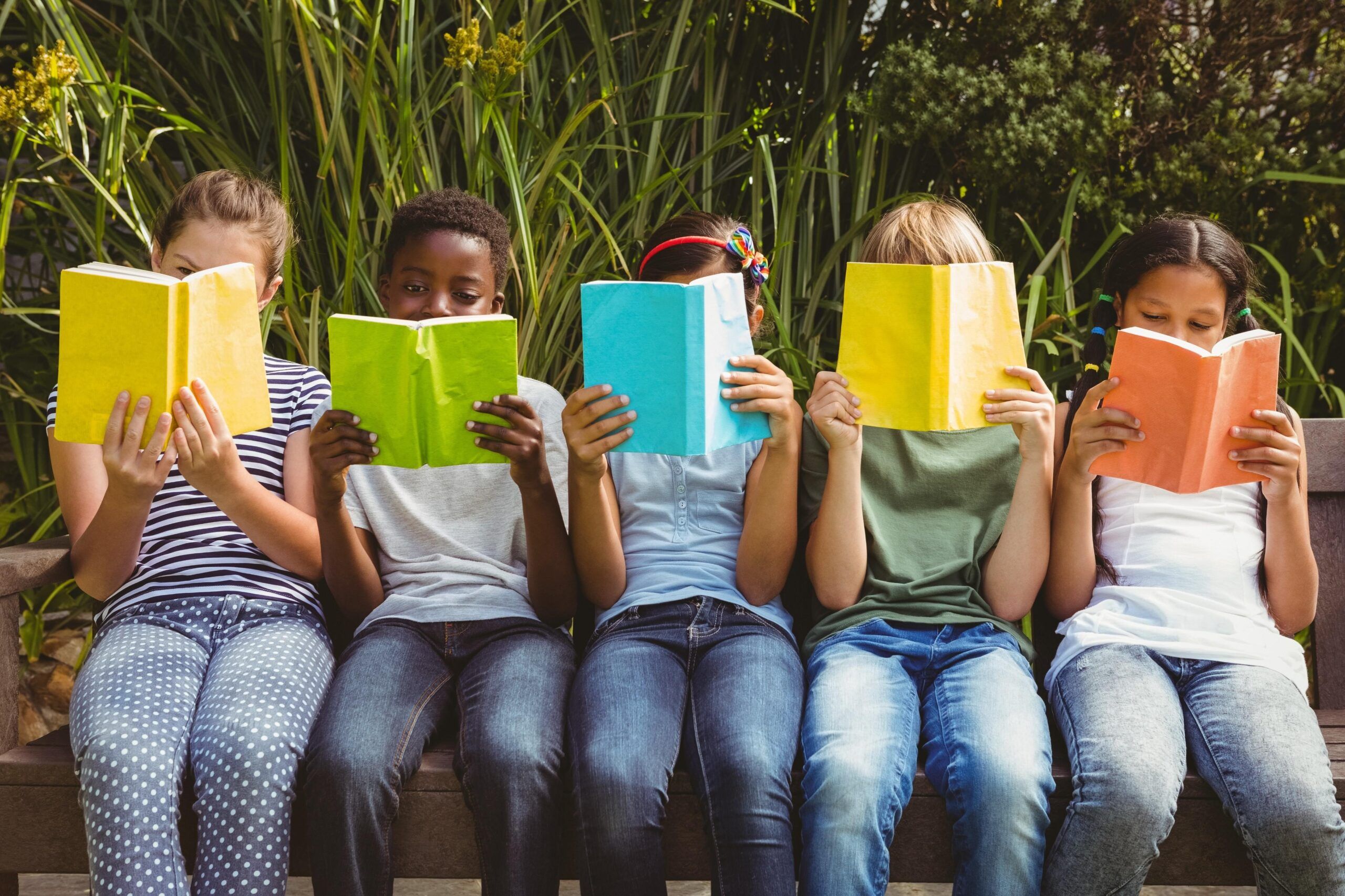 a photo of a group of kids reading