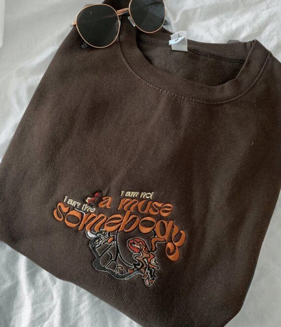 Brown embroidered crewneck with a quote from Daisy Jones & The Six