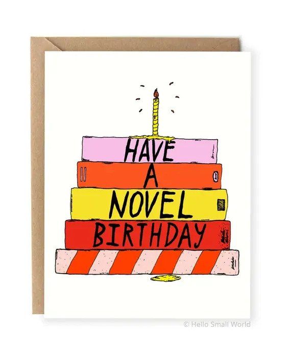 Birthday Card that says "Have a Novel Birthday" with a cake made out of layered books.