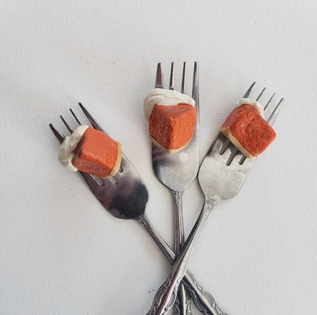 Three fork bookmarks holding pumpkin pie slices