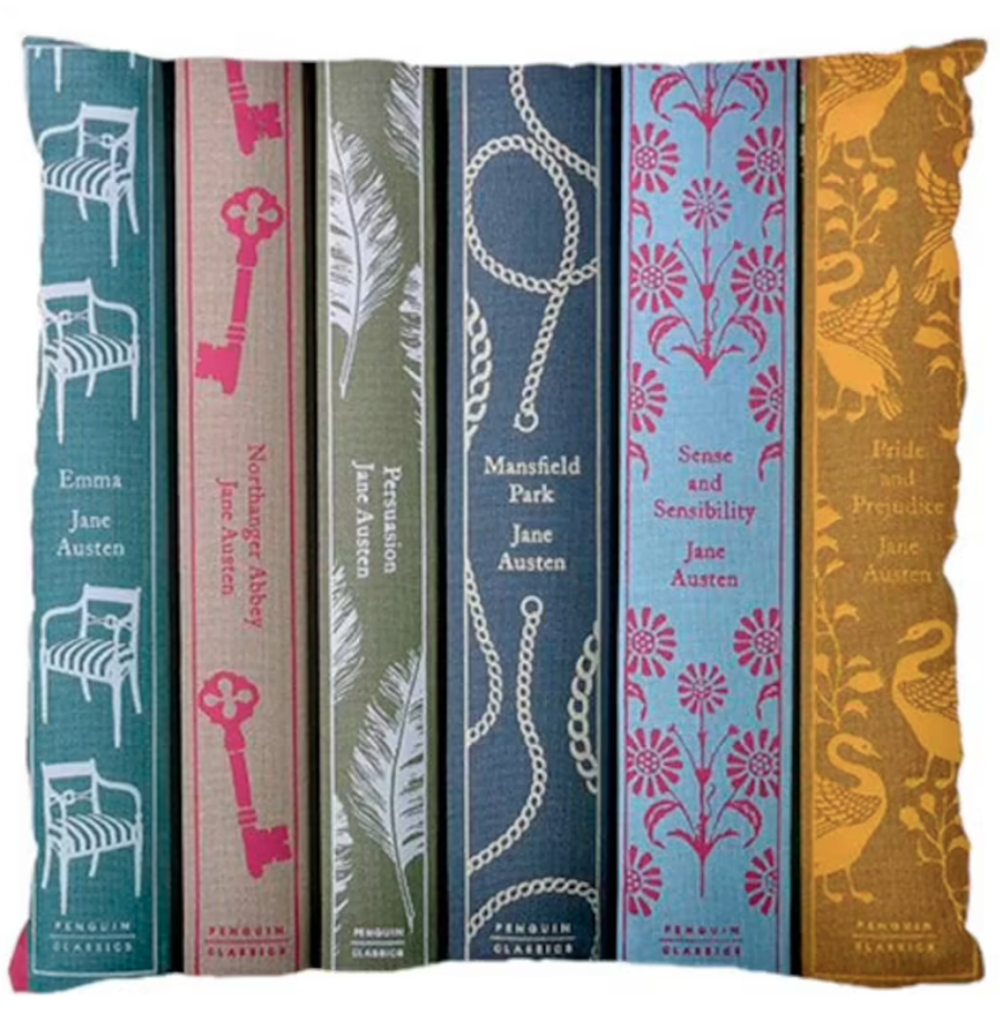 Picture of a pillow case showing the penguin clothbound spines of several of Jane Austen's books