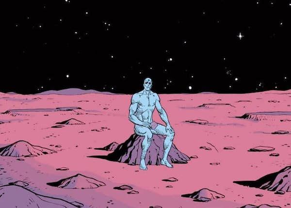 An image of Doctor Manhattan from Watchmen. Doctor Manhattan, a blue man with no hair, sits on a rock on the surface of Mars. He is naked.