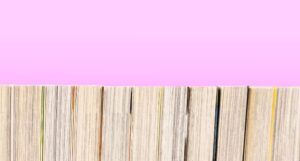 Image of manga pages on pink background