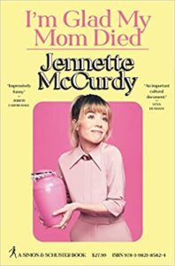 cover of I'm Glad My Mom Died by Jennette Mccurdy; photo of author in a pink dress holding a pink urn