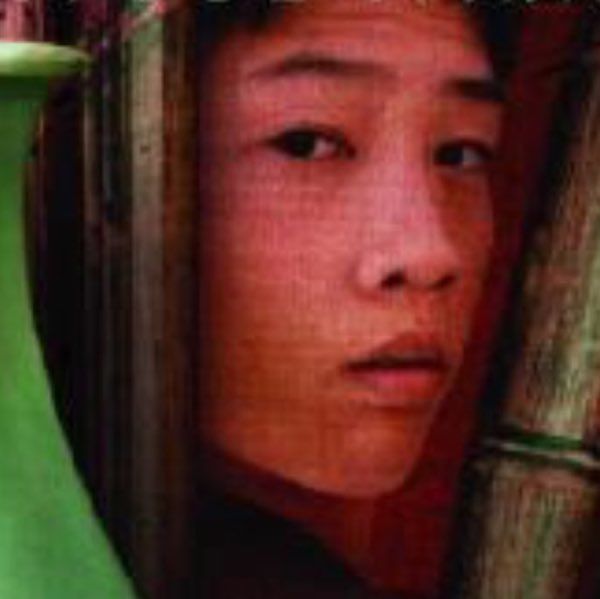 a cropped cover showing a close up of an Asian boy's face