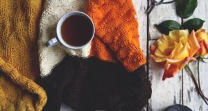 image of a coffee cup and cozy sweater