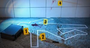 Crime Scene with Evidences and Chalk Outline on Floor