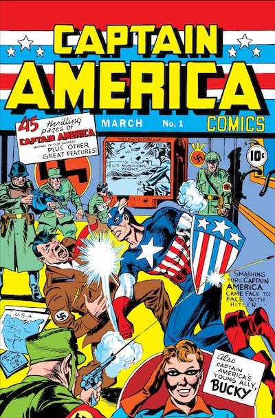 The cover of Captain America #1, showing Captain America punching Hitler in the face in front of startled Nazis. Bucky is saluting in an inset circle at the bottom right.